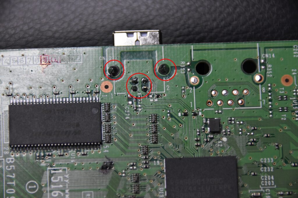 Image showing soldered pins on the back of a laser printer circuit board